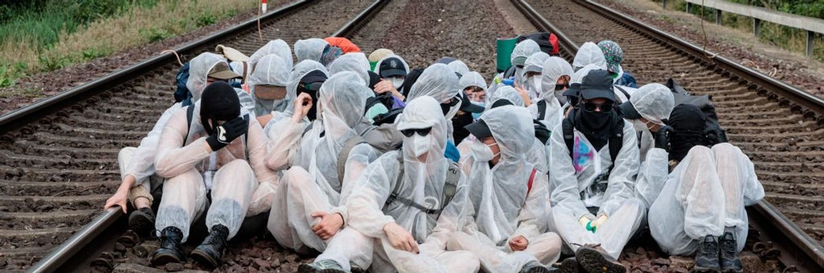 Climate protest sit on train tracks in Hamburg