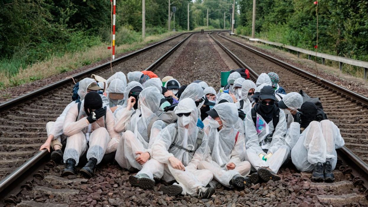 Climate protest sit on train tracks in Hamburg