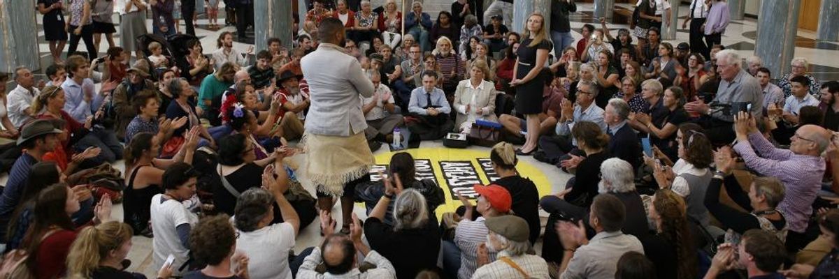 Climate Protesters Storm Australian Parliament to Demand Leaders 'Put People Before Polluters'