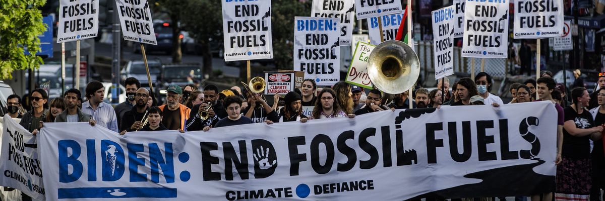 Climate protestors begin to march up Connecticut Avenue towards the White House Correspondents' Dinner