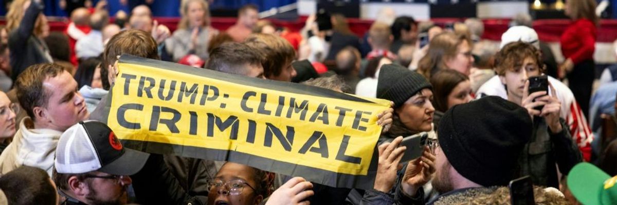 Climate protests at Trump rally.