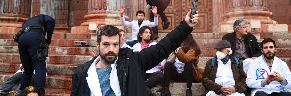 Climate scientists engage in civil disobedience