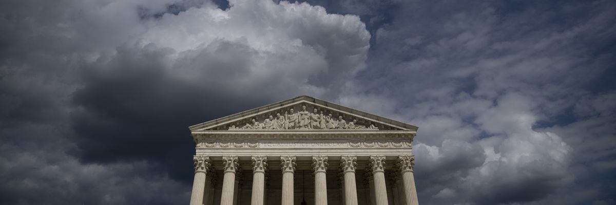 Clouds mass above the U.S. Supreme Court building.