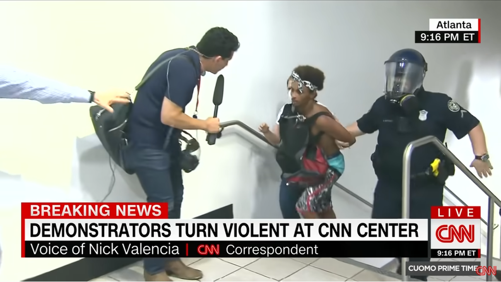 CNN: Demonstrators Turn Violent at CNN Center