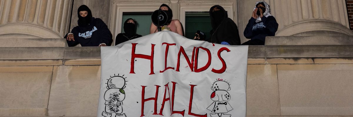 Columbia University student demonstrators unfurl a banner that reads "Hind's Hall"