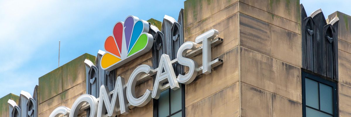 Comcast's logo is seen on the wall of a building at Universal Studios in Orlando, Florida. (Photo: Roberto Machado Noa/LightRocket via Getty Images)