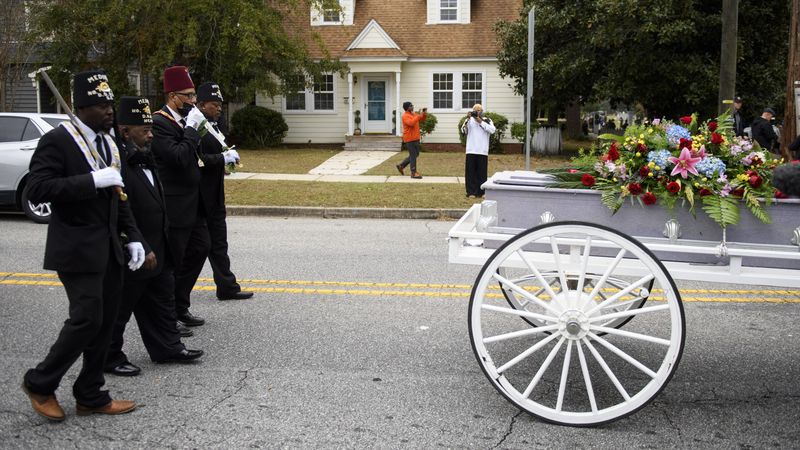 Community members honor victim of Wilmington Coup.