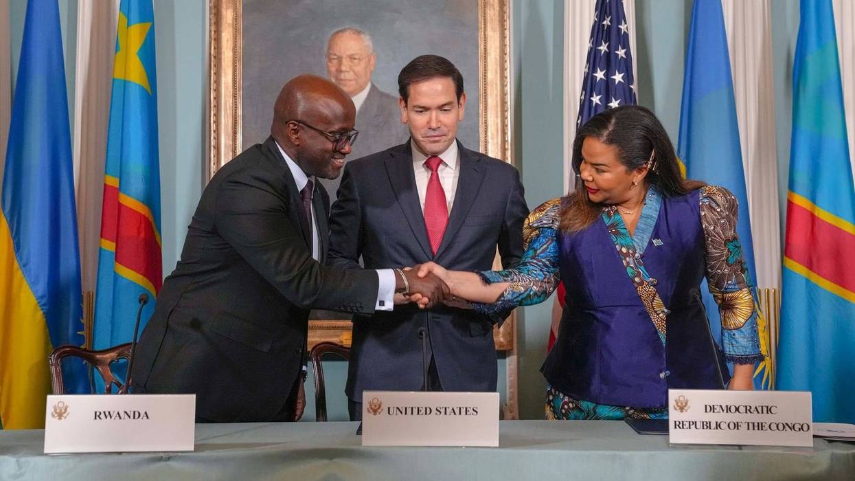 Congo and Rwanda sign peace deal as Rubio looks on.