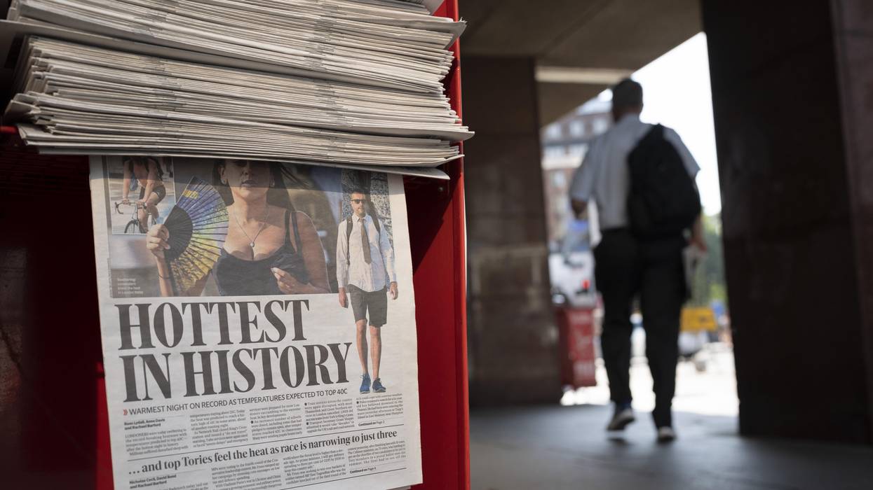 Copies of the Evening Standard at Victoria Station report on the hottest day in U.K.'s history