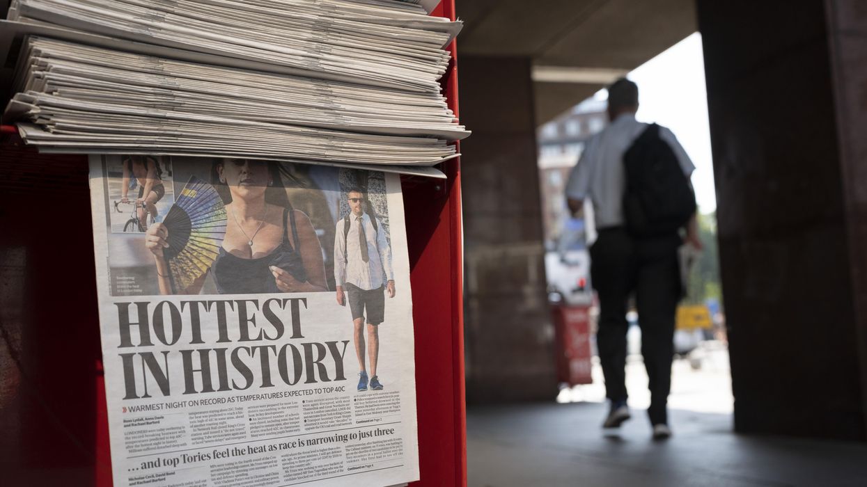Copies of the Evening Standard at Victoria Station report on the hottest day in U.K.'s history