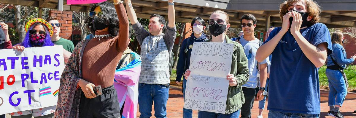 Counter-protestors gather to support transgender swimmer Lia Thomas