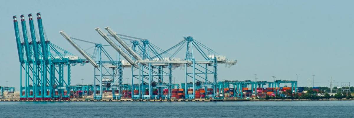 Cranes and containers photographed at the port of Norfolk, Virginia in 2023.
