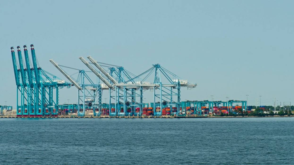 Cranes and containers photographed at the port of Norfolk, Virginia in 2023.
