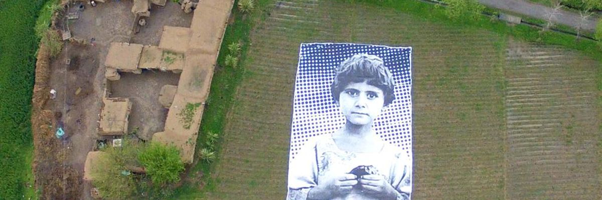 #NotaBugSplat: Artists Use Enormous Portrait to Humanize Victims of US Drones