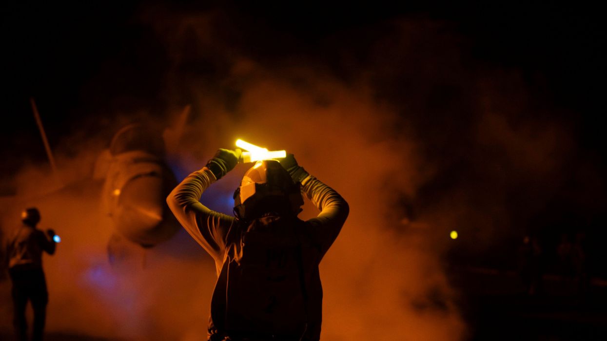Crew direct aircraft on a U.S. carrier