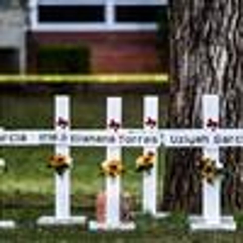 Crosses adorn a makeshift memorial for the shooting victims at Robb Elementary School in Uvalde, Texas, on May 26, 2022.