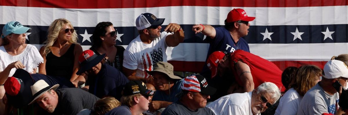 Crowd reacts after Trump shooting