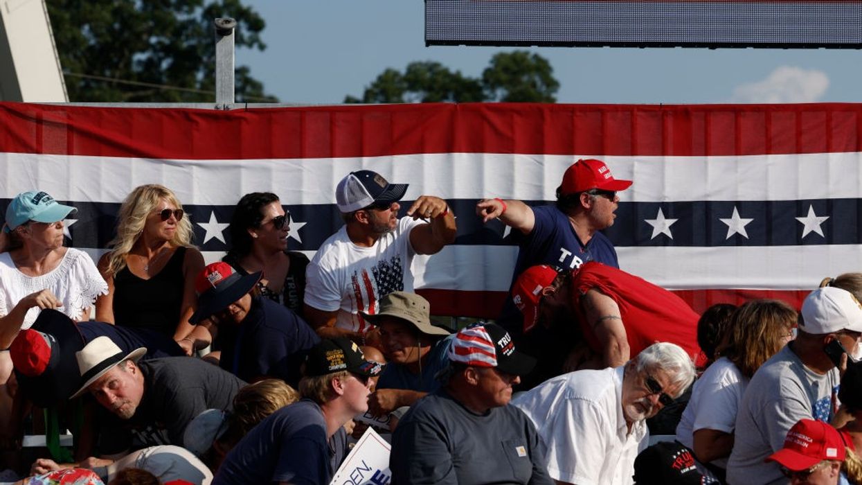 Crowd reacts after Trump shooting