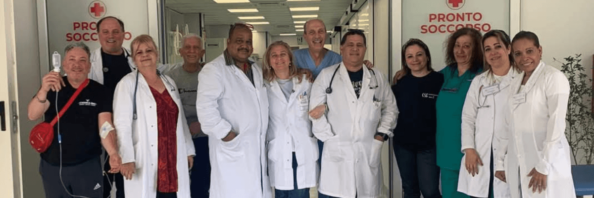 Cuban and Italian doctors pose for a photo in Calabria