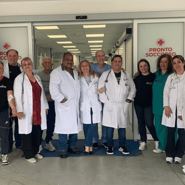 Cuban and Italian doctors pose for a photo in Calabria