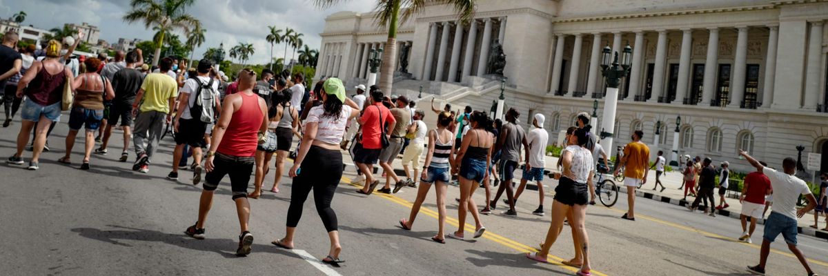 Cubans march in front of the nation's Capitol during a demonstration against the government of Cuban President Miguel Diaz-Canel in Havana, on July 11, 2021. (Photo: Adalberto Roque/AFP via Getty Images)