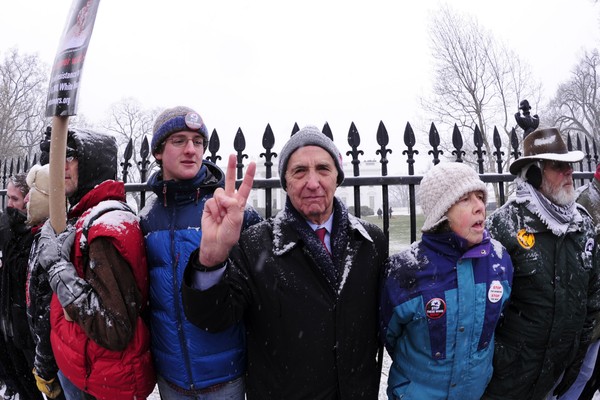 Daniel Ellsberg giving the peace sign