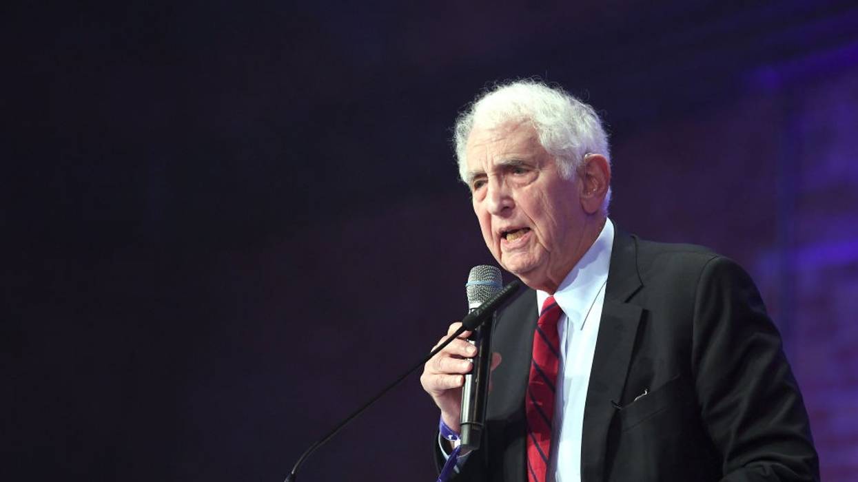 Daniel Ellsberg speaks at a podium.