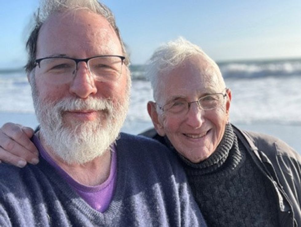 Daniel Ellsberg with his son Robert at the beach