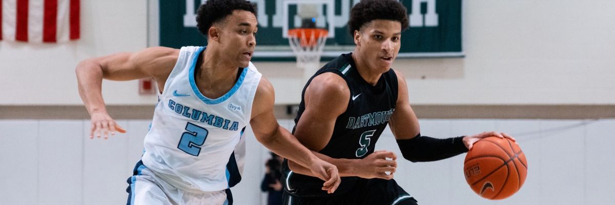 Dartmouth College men's basketball player Jaren Johnson dribbles in a game vs Columbia