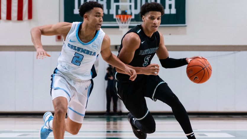 Dartmouth College men's basketball player Jaren Johnson dribbles in a game vs Columbia