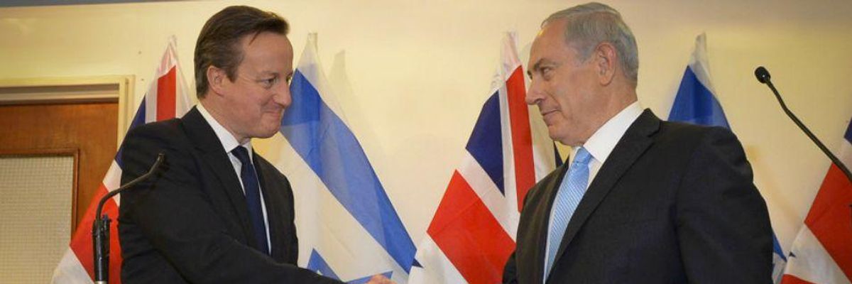 David Cameron shakes Benjamin Netanyahu's hand