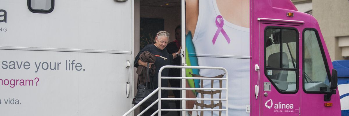 Dawn Dyson leaves a mammography mobile screening bus where free exams were performed in Anaheim, California on October 17, 2016.