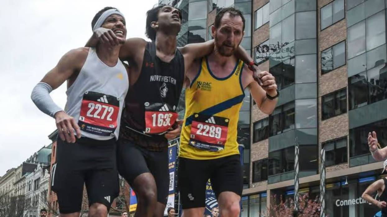 De Oliveira and Beggs help Ajay Haridasse finish the Boston Marathon