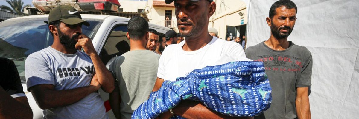 Dead baby brought to Gaza hospital.