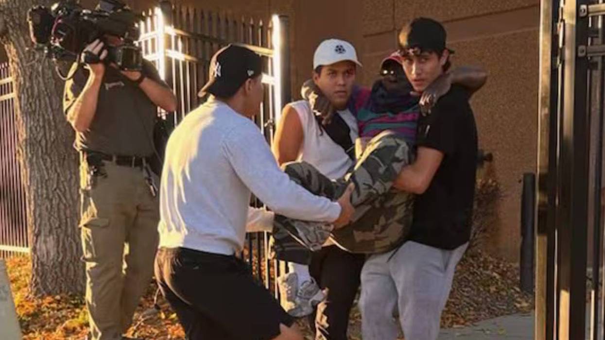 Deeply decent ICE detainees carry Rev. Nalwamba to car