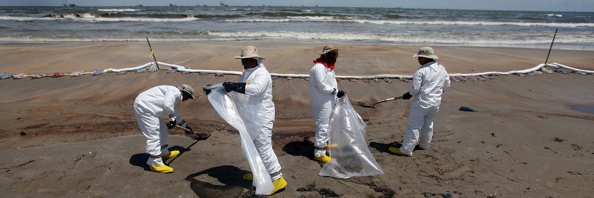 Deepwater Horizon cleanup on beach.