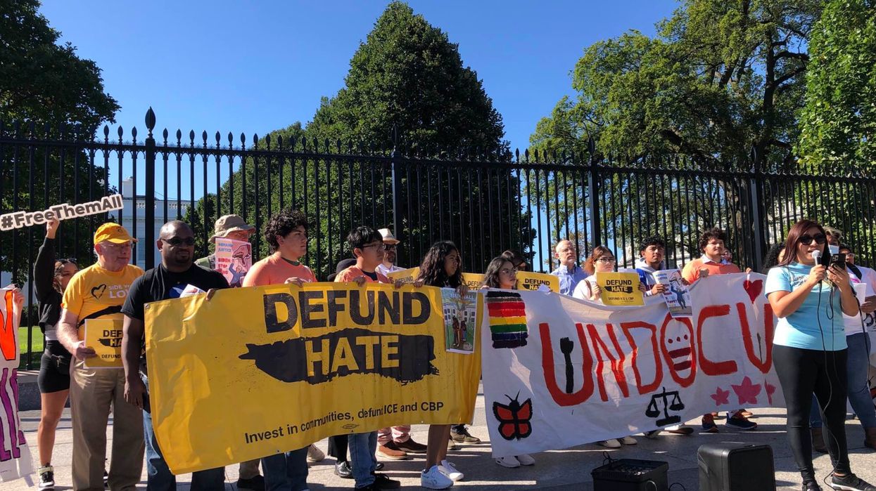 Defund Hate migrant protest White House