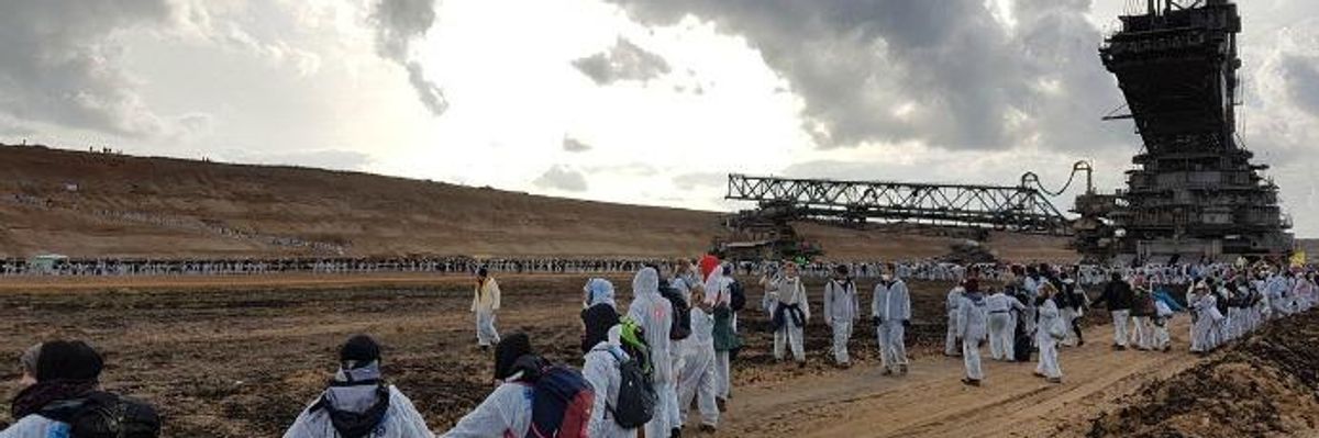 Climate Crisis and Managed Deindustrialization: Debating Alternatives to Ecological Collapse