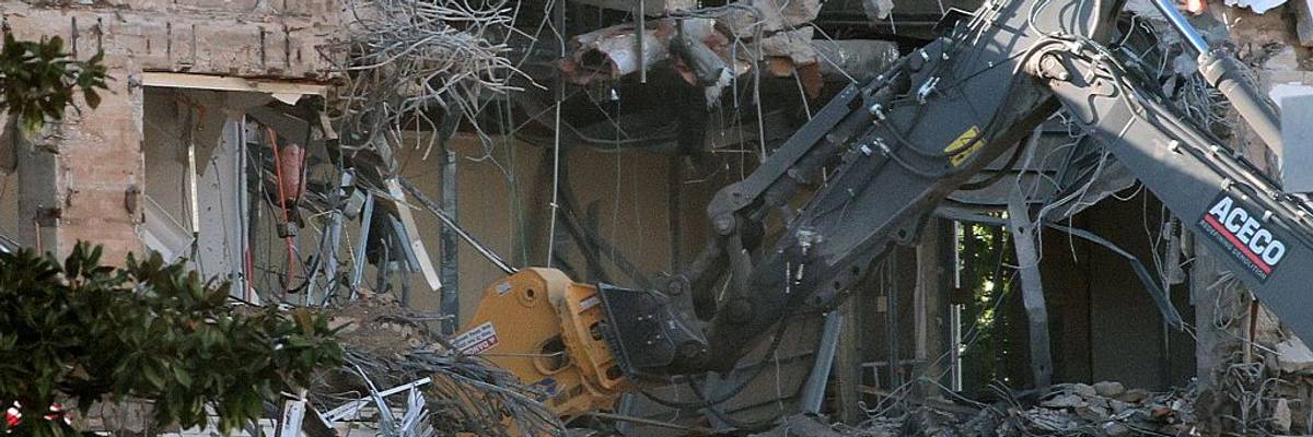 Demolition of East Wing facade.