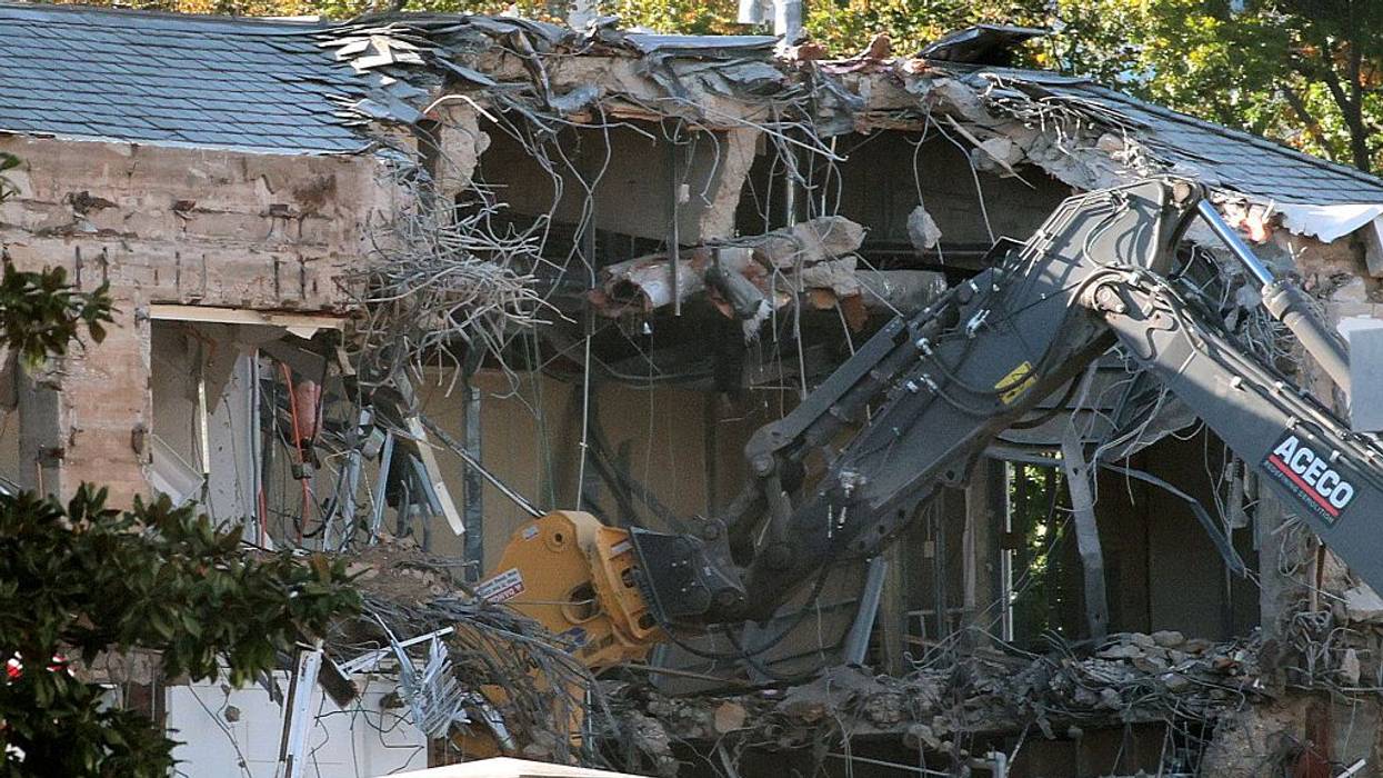 Demolition of East Wing facade.