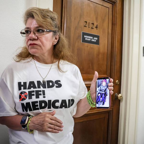 Demonstrator protesting Republican Medicaid cuts