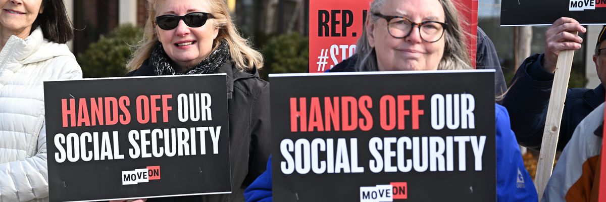 Demonstrators attend a rally in support of Social Security