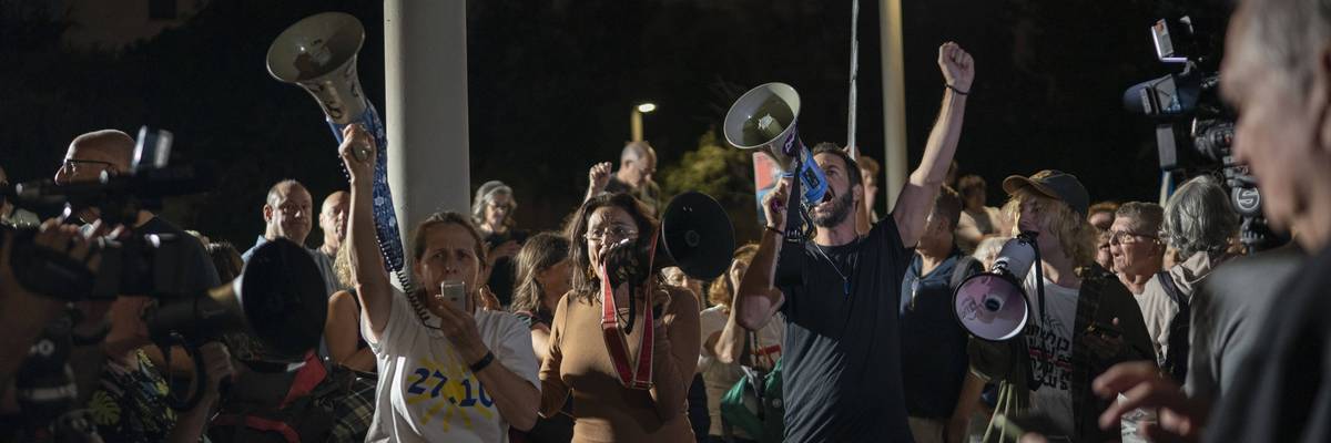 Demonstrators call for Arab-Jewish coalition government during protest in Tel Aviv