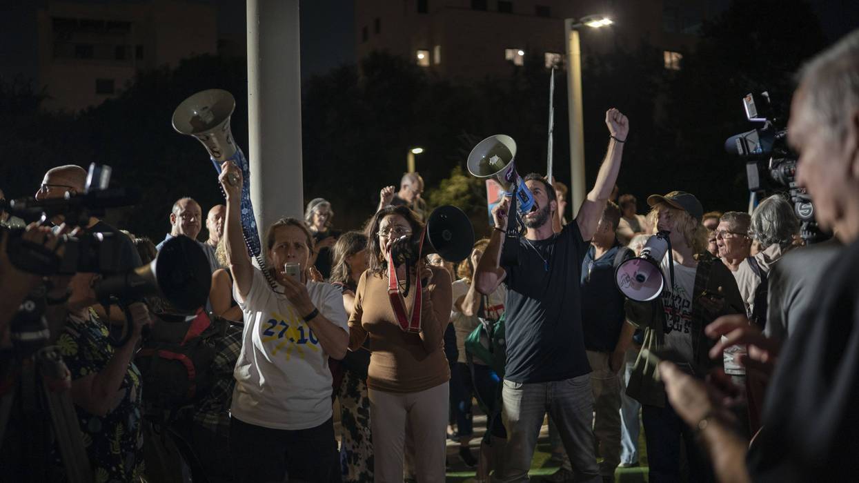 Demonstrators call for Arab-Jewish coalition government during protest in Tel Aviv
