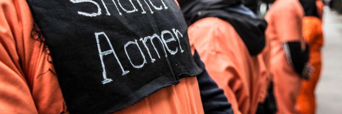 Demonstrators call for the release of cleared Guantanamo Bay detainee Shaker Aamer