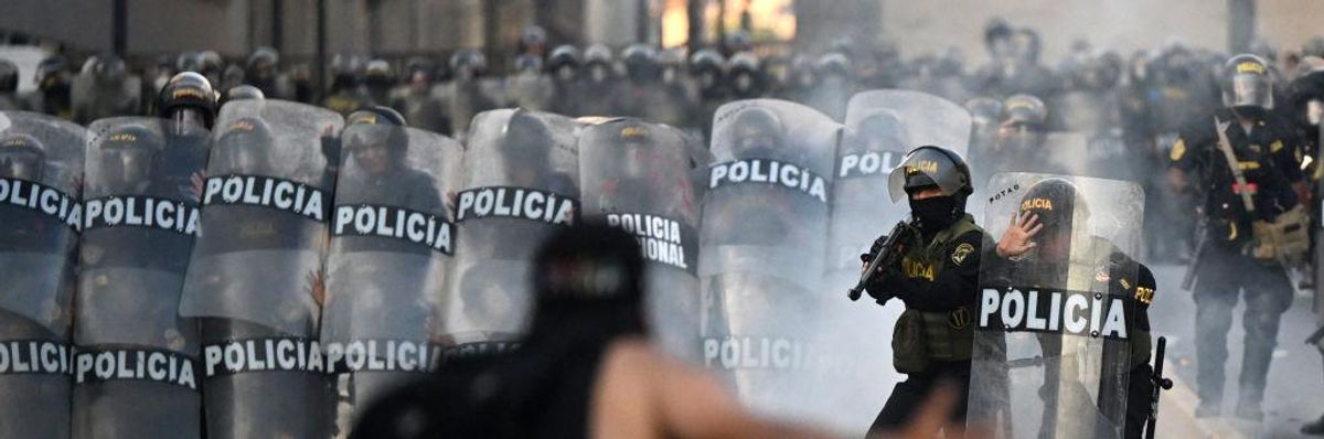 Demonstrators clash with riot police in Peru