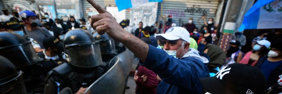 Guatemalan President Reviewing Budget, Which Slashed Healthcare Spending, After Outraged Protesters Set Fire to Legislative Building