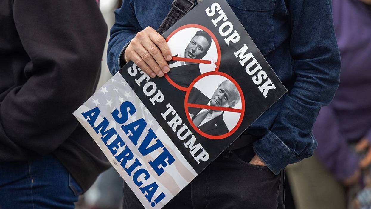 Demonstrators continue weekly protest rallies against U.S. President Donald Trump and his adviser, Tesla CEO Elon Musk, outside of a Tesla dealership