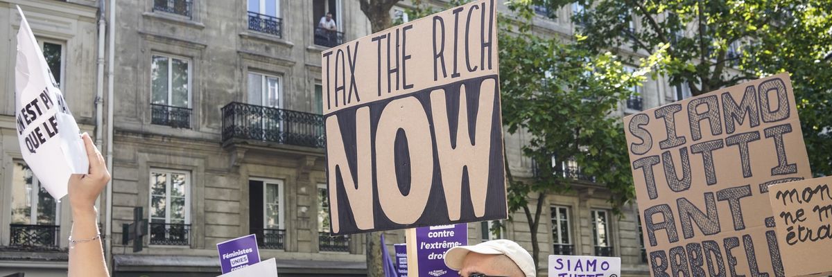 Demonstrators demand higher taxes on the rich