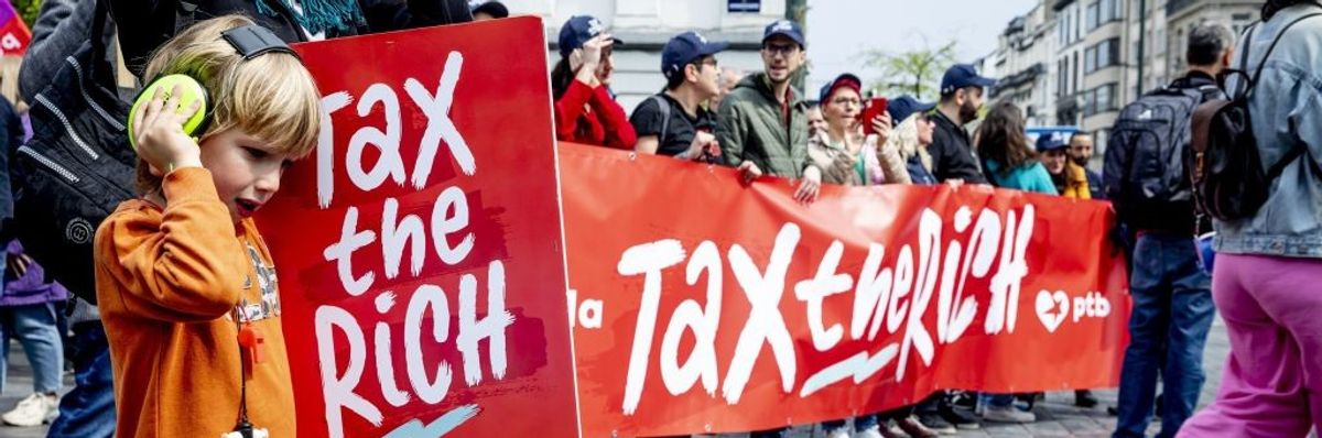 Demonstrators demand higher taxes on the rich